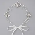 Handmade bridal headpiece with elegant rhinestones and pearls on a grey background - Pearl Rhinestone Vine Hairband Hs-j2683s