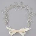 Elegant silver bridal hair vine with sparkling rhinestones, pearls and ivory ribbon bow - Silver Vine Rhinestone Hair Accessory Hs-j6347s