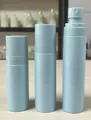 Set of three light blue plastic travel spray bottles in different sizes for cosmetics - 100ml / Blue