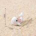 Miniature white ceramic narwhal figurine with red dots and detailed dimension markings - No.6-Beluga