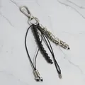 Close-up of metal beaded keychain with irregular silver beads and black stones. - Lava Stone Irregular Style (ZJ16910)