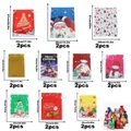 Christmas gift bag set with various Santa and snowman designs in multiple dimensions and sizes - Set 16 (20 Pcs)