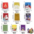 Assorted set of 24 Christmas gift drawstring bags in 4 sizes with festive holiday prints - Set 18 (24 Pcs)