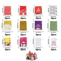 Assorted Christmas drawstring gift bags in multiple sizes with festive patterns - Set 17 (30 Pcs)