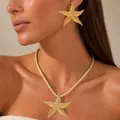 Golden starfish jewelry set with textured pendant necklace and matching earrings - Starfish Style - Gold