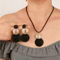 Elegant black and gold geometric jewelry set with necklace and stud earrings - Black Disc Style - Black Gold