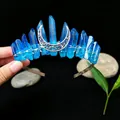 Close-up of handmade blue raw crystal crown featuring an intricate silver crescent moon - Blue