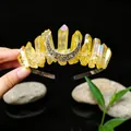 Macro view of handmade natural yellow quartz crystal tiara with an intricate silver crescent moon - Yellow