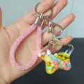 Portachiavi creativo a forma di stella con olio, perline e cinturino in cristallo rosa - Stile Corda Scintillante / Giallo Limone