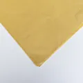 Close-up view of premium brown pear paper for flower and gift packaging texture - Earthy Yellow