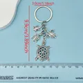 Detail view of silver sea turtle ocean theme keychain with size measurements 9.9cm by 3cm - Retro Silver Sea Turtle Series (Q160)