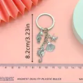 Detail showing ocean-themed seahorse starfish keychain dimensions with a size measurement line - Retro Silver Seahorse Starfish (Q414)