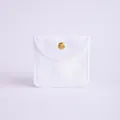 Elegant white double-sided plush jewelry pouch featuring a secure golden snap button - Velvet Style (White) / 8x8cm
