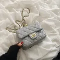 Quilted light grey shoulder bag with gold chain strap and metal ball detail - Gray