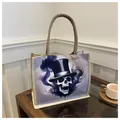 Gothic skull canvas tote bag with woven handles and artistic purple smoke print - Purple Smoke Skull (Style 2)