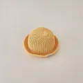 Close-up detail of a breathable yellow woven straw sun hat for infants and toddlers - Infant Size / Plain Style / Yellow