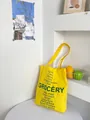 Borsa tote in tela gialla retrò con stampa di lettere verdi per la spesa quotidiana - Giallo