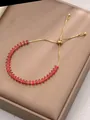 Detail of red marquise zircon bracelet with adjustable gold slider chain closure - Red
