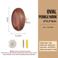 Solid walnut wood oval cobblestone shaped wall hook including mounting hardware - Oval Walnut Pebble Hook