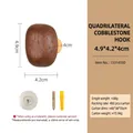 Minimalist cobblestone-shaped solid wood wall hook in walnut finish with dimensions - Quadrilateral Walnut Pebble Hook