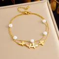 Elegant double-layered gold-plated anklet with butterfly charms and white pearls - Pearl Butterfly Double Layer Style (B1624)
