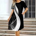 Close-up view of a women's round neck dress featuring an abstract wave pattern - Black