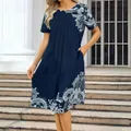 Elegant navy blue round neck short sleeve dress with white paisley floral print accents - S / Navy Blue