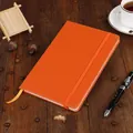 Professional orange A5 business notebook featuring a premium leather cover and elastic strap - Orange