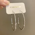 Grandi orecchini a cerchio in argento S925 impreziositi da scintillanti zirconi - Grandi Cerchi con Pavé di Zirconia (E1167 Argento) / Perno in argento 925 / Argento