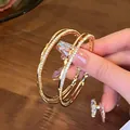 High-end gold hoop earrings with sparkling cubic zirconia stones and S925 silver needles - Outer Ring Pave Zirconia Hoop (E2162 Gold) / 925 Silver Needle / Gold
