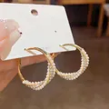 Elegant gold plated hoop earrings with white pearls and sparkling crystals, S925 silver pins - Wavy Artificial Pearl and Zirconia (E2043 Gold) / 925 Silver Needle / Gold