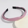 Elegante diadema acolchada trenzada rosa suave con dientes antideslizantes para mujer pelo - Morado