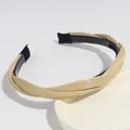 Elegant minimalist twisted beige faux leather headband with anti-slip teeth design - Khaki