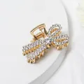 Elegante molletta per capelli in metallo dorato con strass scintillanti e design a fiocco - Stile Fiocco Strass (E7418)