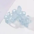 Lot de trois pinces à cheveux fleur 3D bleu clair avec une finition en résine translucide - Bleu