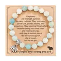 Macro detail view of the silver elephant charm on a beaded healing energy bracelet card - Elephant Theme Style (With Card)