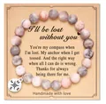 Handmade pink zebra stone bead bracelet featuring a silver compass charm pendant - Compass Pendant Style