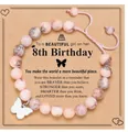 Pink zebra stone bracelet with butterfly charm on 8th birthday gift card - Braided Butterfly Message Style (With Card)