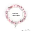 Natural pink zebra stone beaded bracelet with silver ribbon charm, 19cm circumference - Butterfly Pink Zebra Ribbon Style