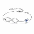 Elegant silver infinity symbol bracelet featuring a blue heart crystal charm decoration. - Silver Heart Infinity Style (Blue Rhinestone)