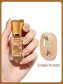 Gold glitter nail polish variant with butterfly patterns, shade 32 Dynamic Starlight - 32 Vivid Starlight Gold