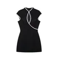 Detailed view of an elegant black new Chinese style Qipao dress with white piping. - XS / Black