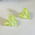 Detailed close-up view of lime green candy color glossy heart-shaped stud earrings. - Light Green (32439-ear-light green-EP)
