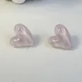 Close-up detail of candy-colored pink heart-shaped stud earrings with smooth finish - Light Purple (32439-ear-purple-EP)