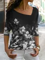 Dames T-shirt met lange mouwen, bloemenprint, asymmetrische halslijn in het zwart - S / Zwart