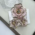 Set of three elegant pink flower hair clips with golden edges on display card - Large And Small Claw Clips Combination / Gold Edged Jelly Pink