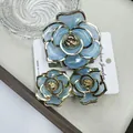 Elegant light blue camellia flower hair claw and clip jewelry set with metallic gold trim - Blue Rose Jelly Set With Gold-edged Clasp (includes Card)