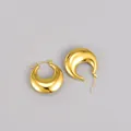 Elegante chunky goudkleurige titaniumstalen holle creolen met een glad gepolijste afwerking - 18K Goud