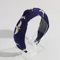 Stylish navy blue wide fabric knotted headband featuring golden bird pattern motifs - Navy Blue Bird Print