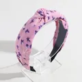 Pink floral knotted headband made of soft fabric with a stylish wide brim design - Printed Pink